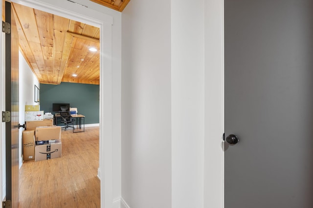 hall with wood ceiling and hardwood / wood-style flooring