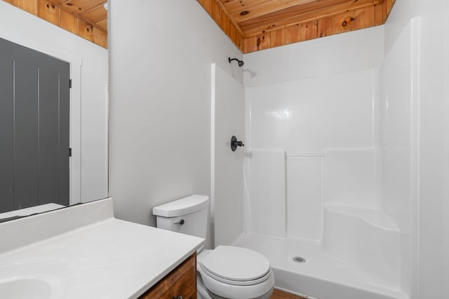 bathroom featuring wood ceiling, vanity, toilet, and walk in shower