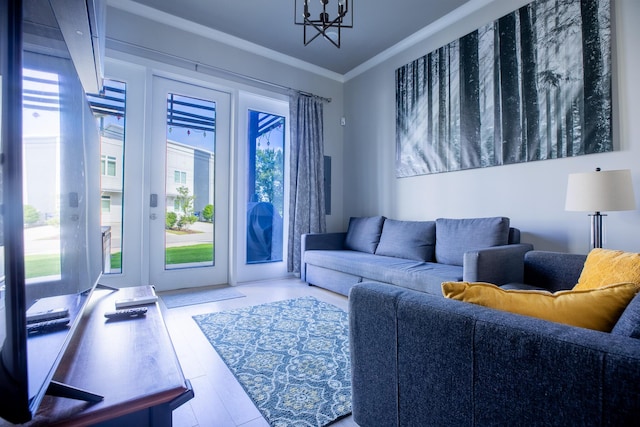 living room with crown molding and hardwood / wood-style flooring