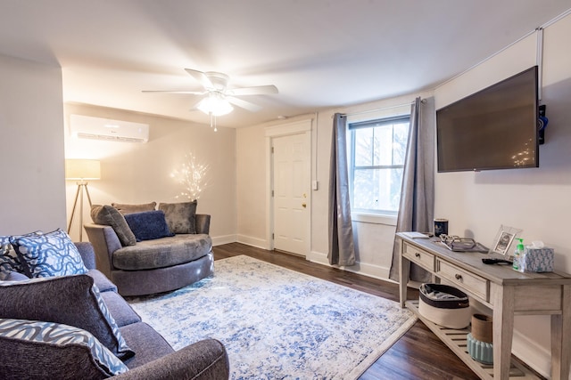 living area with baseboards, a wall mounted air conditioner, ceiling fan, and wood finished floors