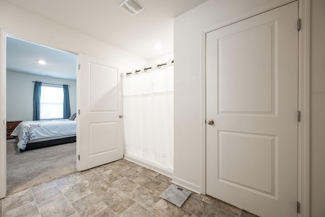 bathroom with shower / bath combination with curtain