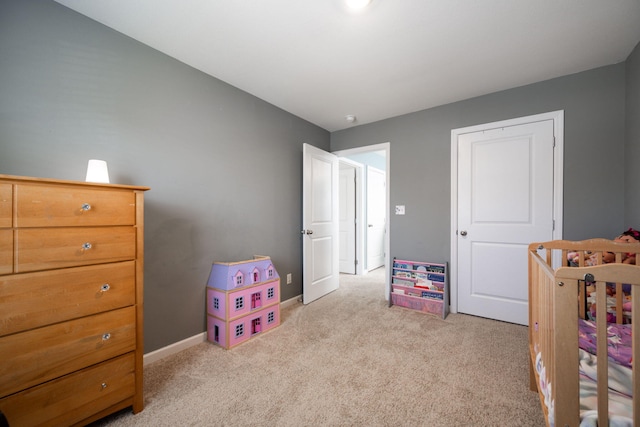 bedroom with light carpet