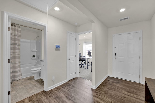 foyer with hardwood / wood-style flooring