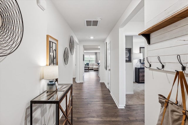 hall featuring dark wood-type flooring