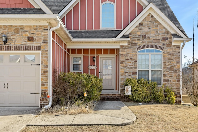 view of exterior entry with a garage