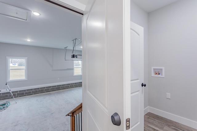 bathroom featuring plenty of natural light and wood-type flooring