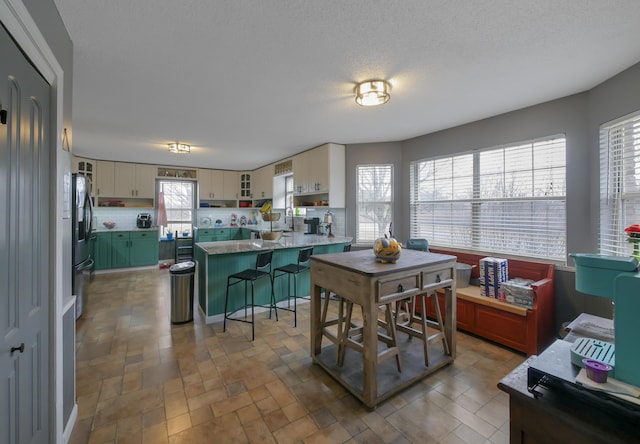 dining room with a textured ceiling