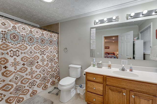 bathroom with ornamental molding, vanity, a textured ceiling, and toilet