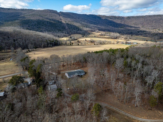 drone / aerial view with a mountain view and a rural view