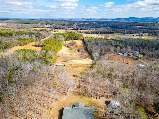 birds eye view of property featuring a rural view