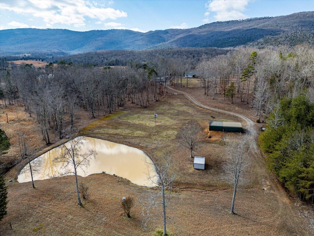 bird's eye view with a water and mountain view