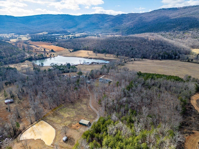 bird's eye view with a water and mountain view