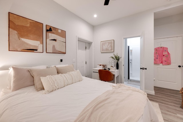 bedroom with hardwood / wood-style flooring and ceiling fan