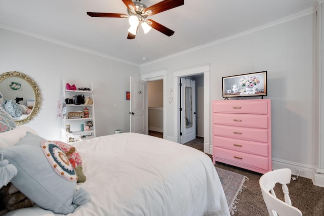 bedroom featuring ceiling fan, ornamental molding, and dark carpet