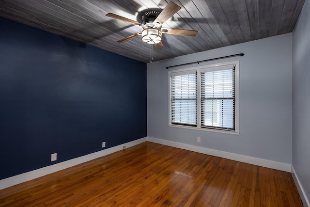 4220 Saint Elmo Ave, Chattanooga, TN 37409 - empty room featuring baseboards, a ceiling fan, and hardwood / wood-style floors