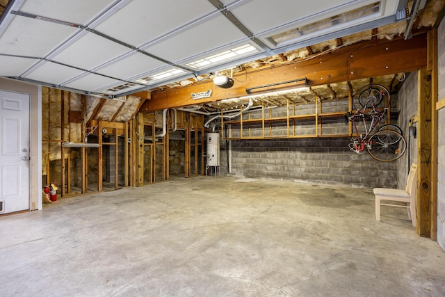 4220 Saint Elmo Ave, Chattanooga, TN 37409 - garage with gas water heater and concrete block wall