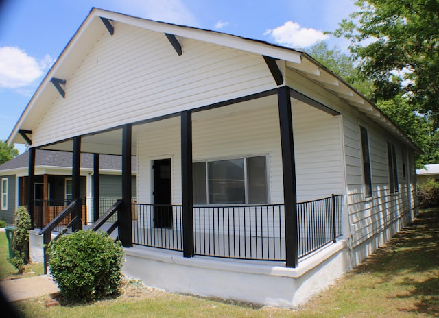 exterior space featuring covered porch