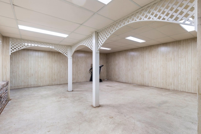 basement featuring a paneled ceiling