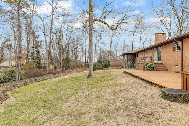 view of yard featuring a deck