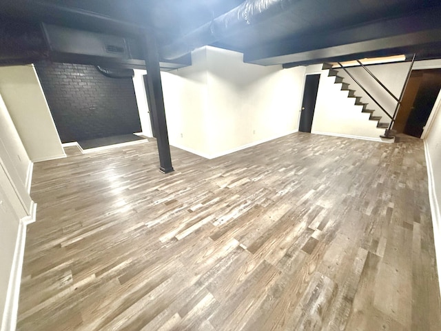 basement with wood-type flooring