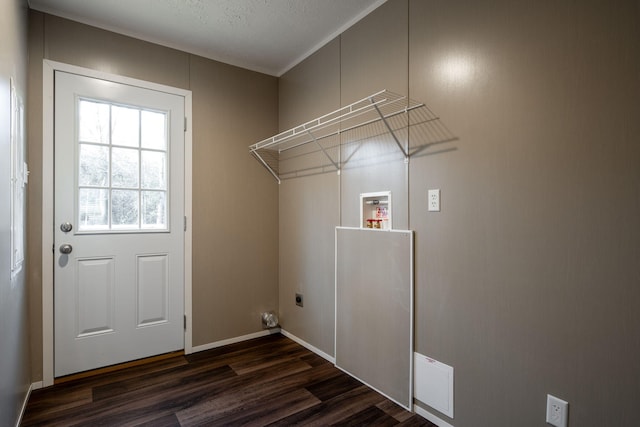 washroom featuring electric dryer hookup, dark wood-type flooring, and washer hookup