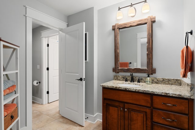 bathroom featuring vanity and tile patterned flooring