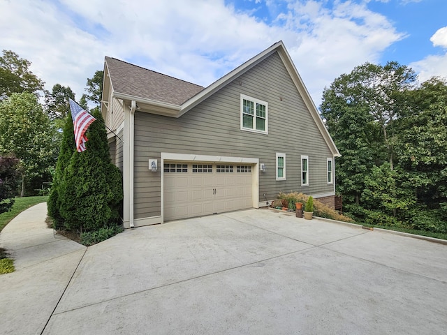 view of home's exterior with a garage