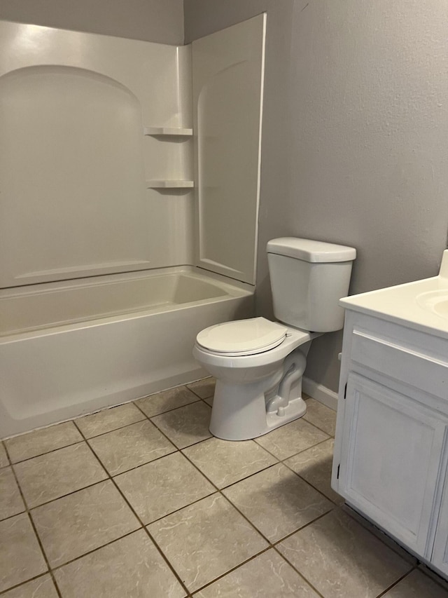 full bathroom featuring vanity, tile patterned flooring,  shower combination, and toilet