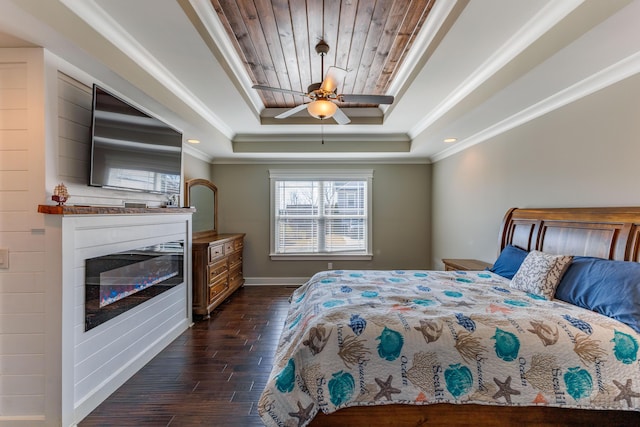 bedroom with wooden ceiling, ornamental molding, dark hardwood / wood-style floors, a raised ceiling, and ceiling fan