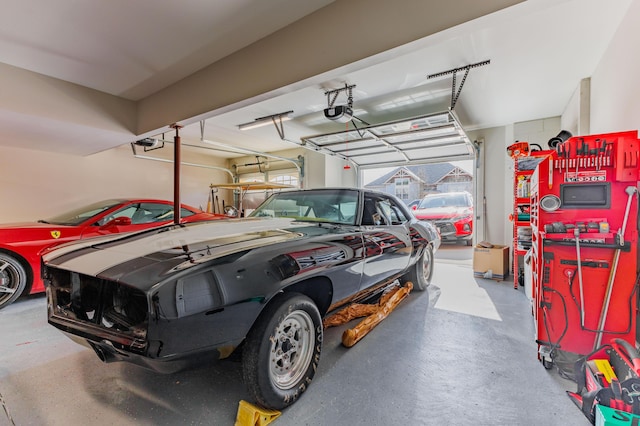 garage featuring a garage door opener