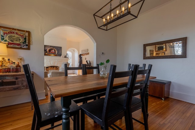 dining room with hardwood / wood-style flooring