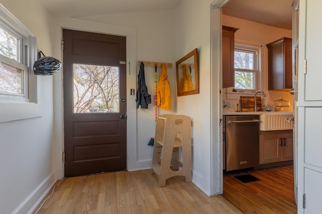 entryway with light wood-type flooring