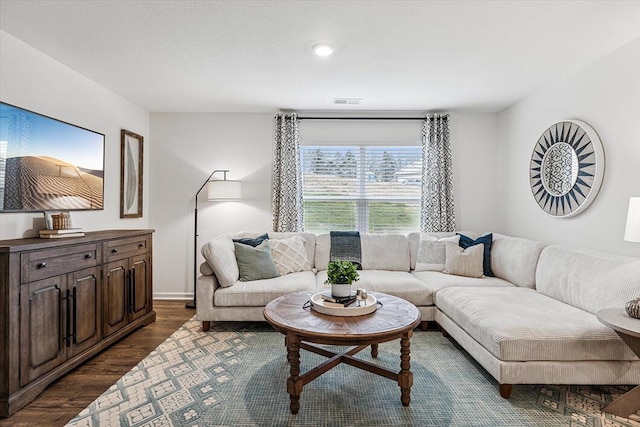 living room with dark hardwood / wood-style floors