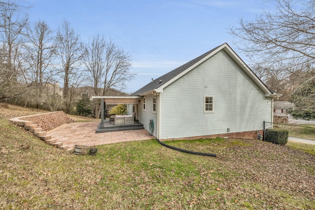 rear view of property with a patio, a lawn, and a pergola