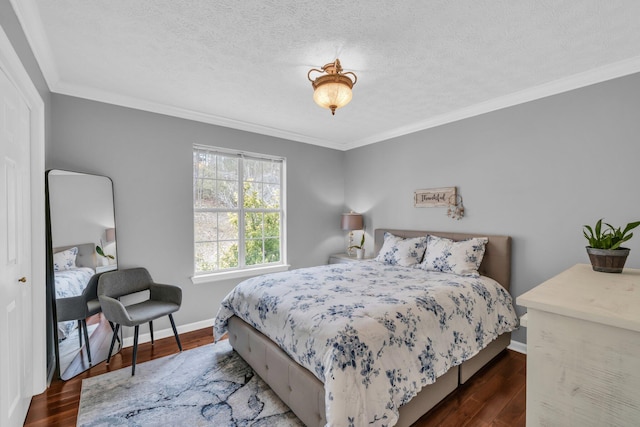 bedroom featuring a textured ceiling, crown molding, and dark hardwood / wood-style flooring