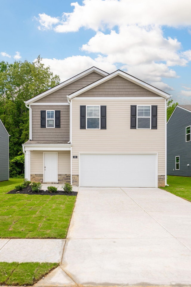345 Draft St, Rossville, GA 30741 - craftsman inspired home featuring a garage, driveway, stone siding, and a front yard