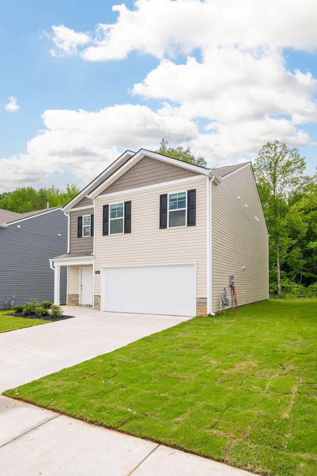 345 Draft St, Rossville, GA 30741 - craftsman-style home featuring a garage, driveway, a front yard, and stone siding