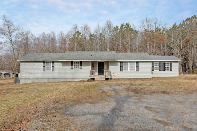 view of front of home with a front lawn