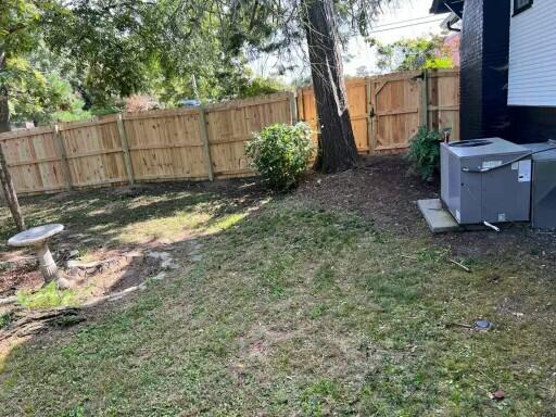 view of yard featuring central AC unit