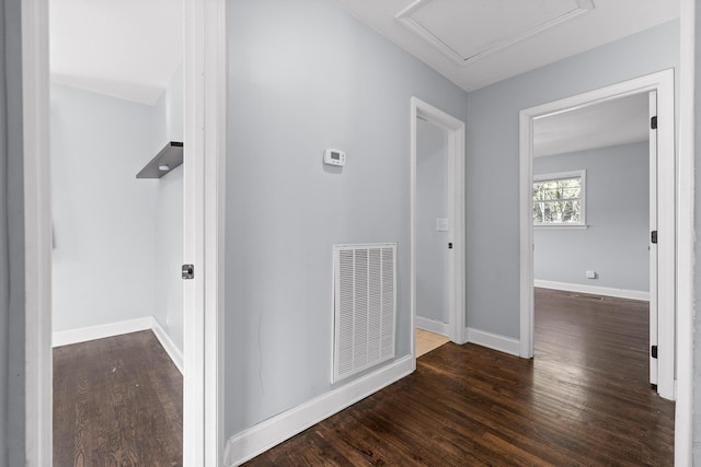 corridor featuring dark wood-type flooring