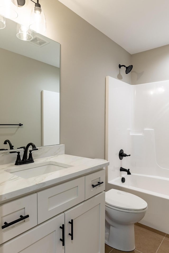 full bath featuring visible vents, toilet, tile patterned flooring, bathtub / shower combination, and vanity