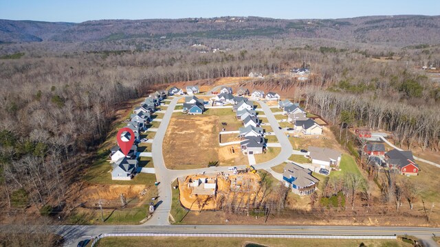 drone / aerial view with a forest view