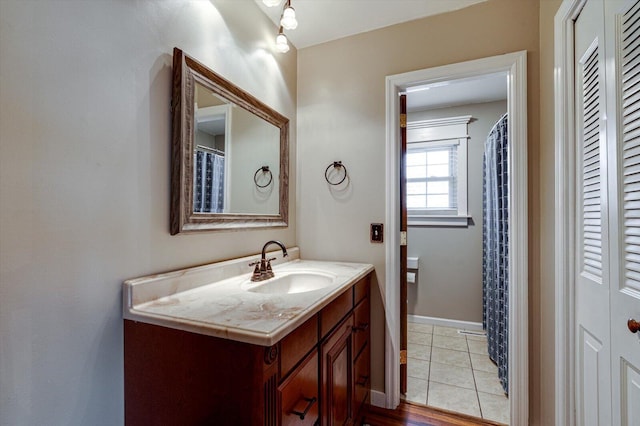 bathroom featuring vanity and tile patterned flooring