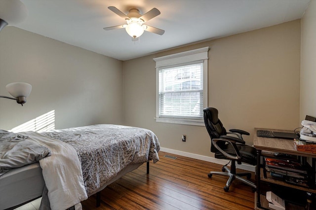 bedroom featuring hardwood / wood-style floors and ceiling fan