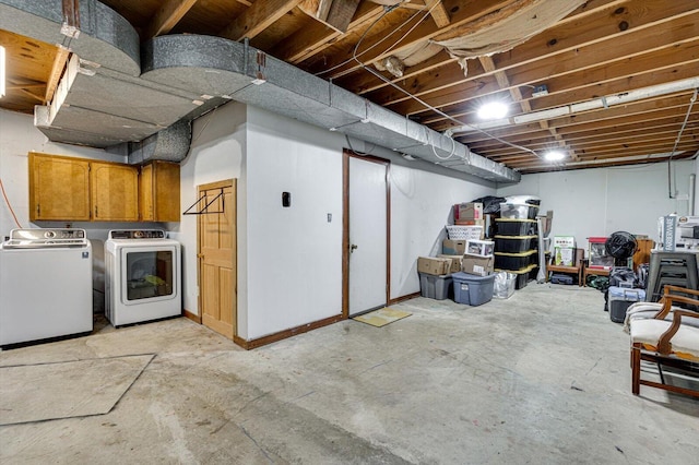 basement with separate washer and dryer