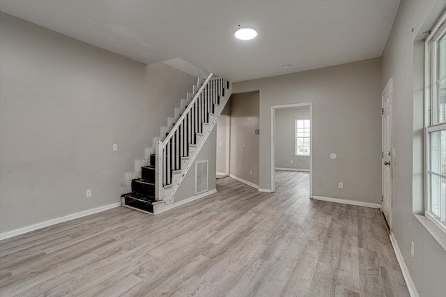 entrance foyer featuring light wood-type flooring