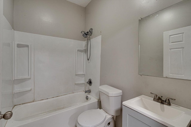 full bathroom with washtub / shower combination, vanity, and toilet