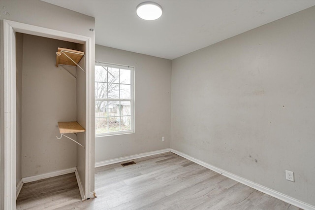 unfurnished bedroom with light hardwood / wood-style flooring