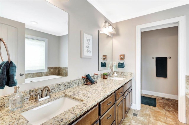 bathroom with vanity and a bathtub