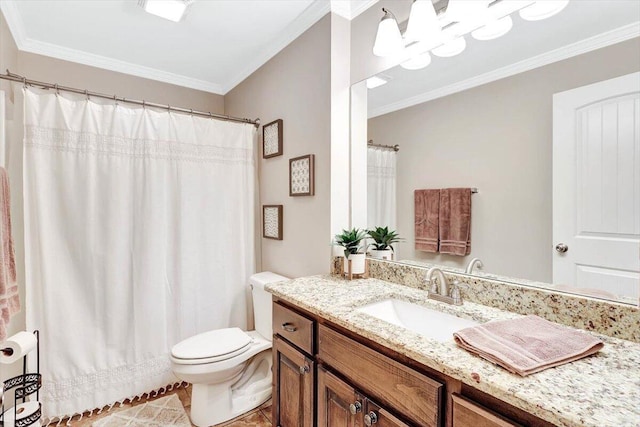 bathroom featuring vanity, crown molding, tile patterned floors, and toilet